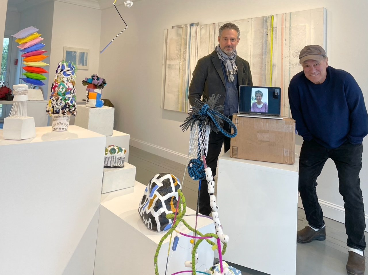 “Budding” exhibit artists Larry Wolhandler (right) and Fukuko Harris (in a FaceTime moment) with Marquee Projects Inc. gallery owner and artist Mark Van Wagner. The new exhibit kicked off Saturday and will be at the Bellport gallery to May 22.
